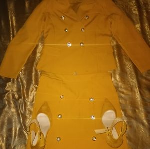2 piece mustard skirt set with mustard shoes.